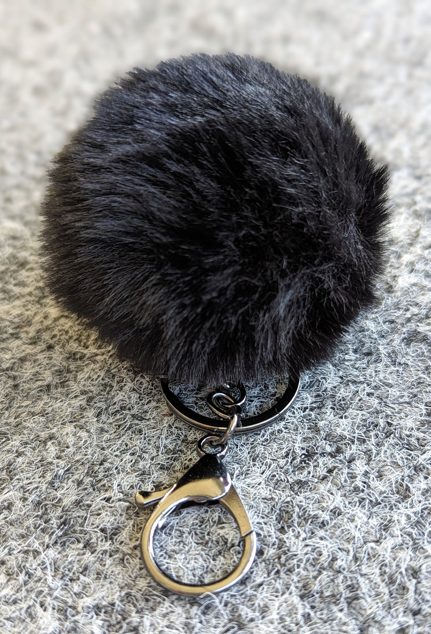 Pompom pynt til veske